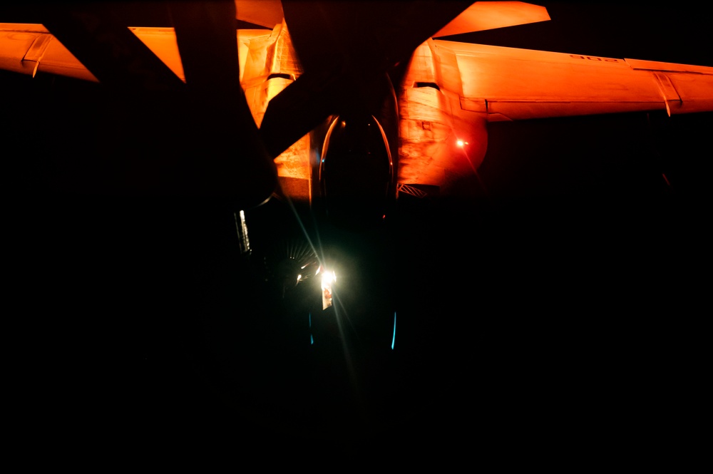 U.S. Navy F/A-18 Super Hornet refuels at night