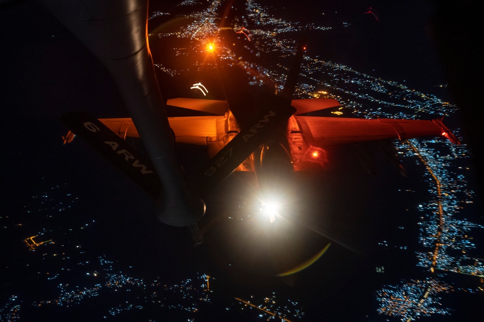 U.S. Navy F/A-18 Super Hornet refuels at night
