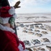 Santa takes flight with the 54th Helicopter Squadron