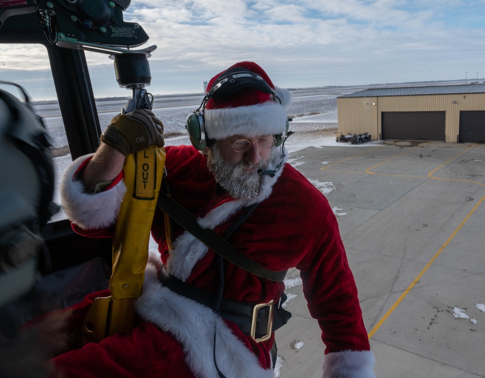 Santa takes flight with the 54th Helicopter Squadron