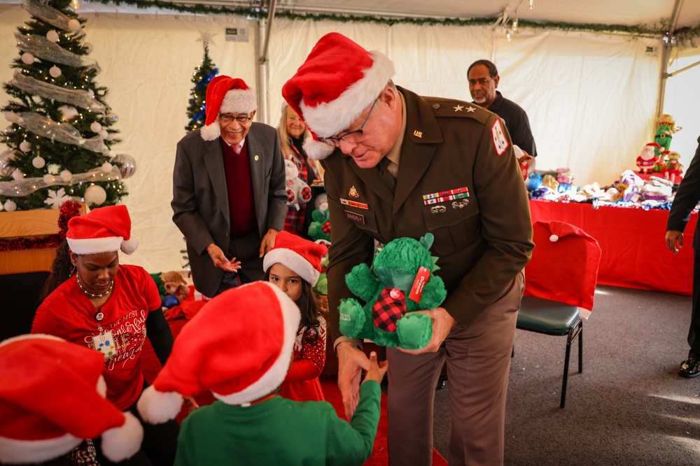 Lt. Gen. Retired Arthur Gregg among cherished guests at Holiday Helper Open House