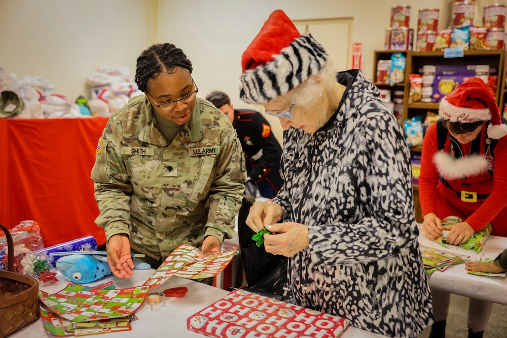 Lt. Gen. Retired Arthur Gregg among cherished guests at Holiday Helper Open House