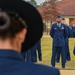 Air Force cadets at Officer Training School gather in formation