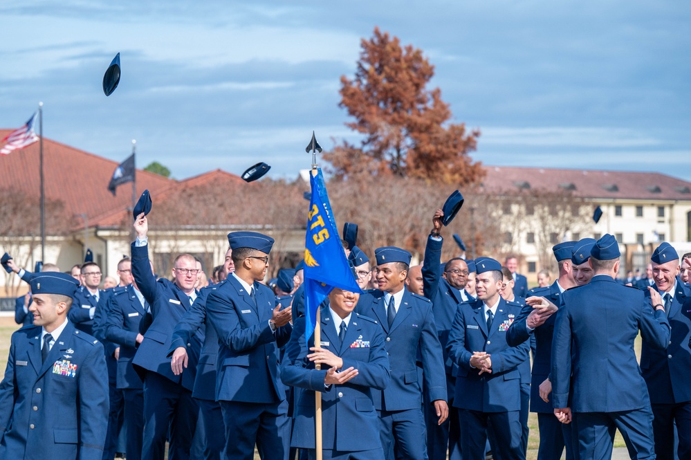 Newly commissioned officers celebrating OTS graduation