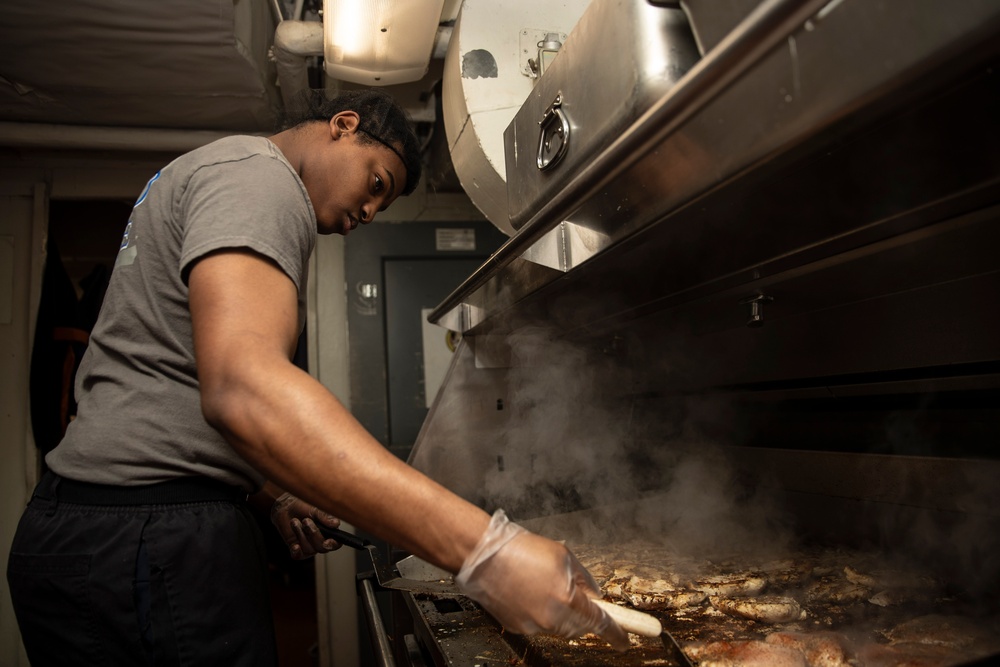 Abraham Lincoln Sailor prepares lunch