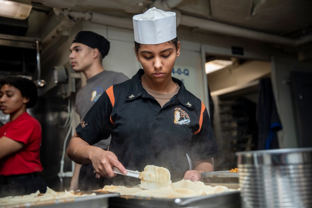 Abraham Lincoln Sailor prepares lunch
