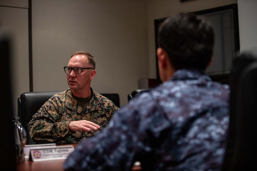 Stocked and Ready: Marine Corps Air Station Iwakuni Officials and Japan Maritime Self-Defense Force members discuss the vital role MCAS Iwakuni plays in the Indo-Pacific