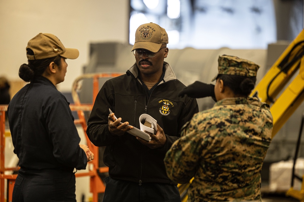 Sailors and Marines Work Together Aboard Wasp