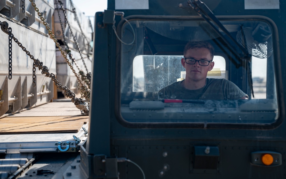 Logistics Airmen load cargo for ACE