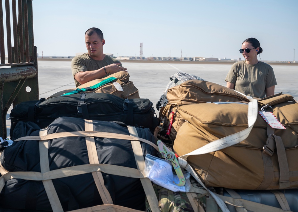 Logistics Airmen load cargo for ACE