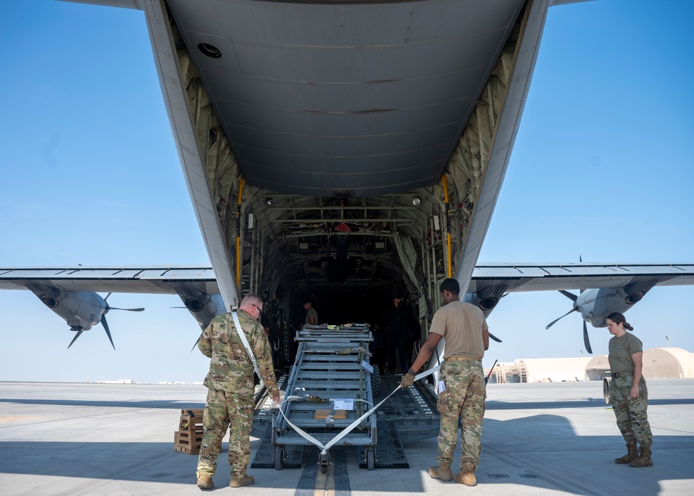 Logistics Airmen load cargo for ACE