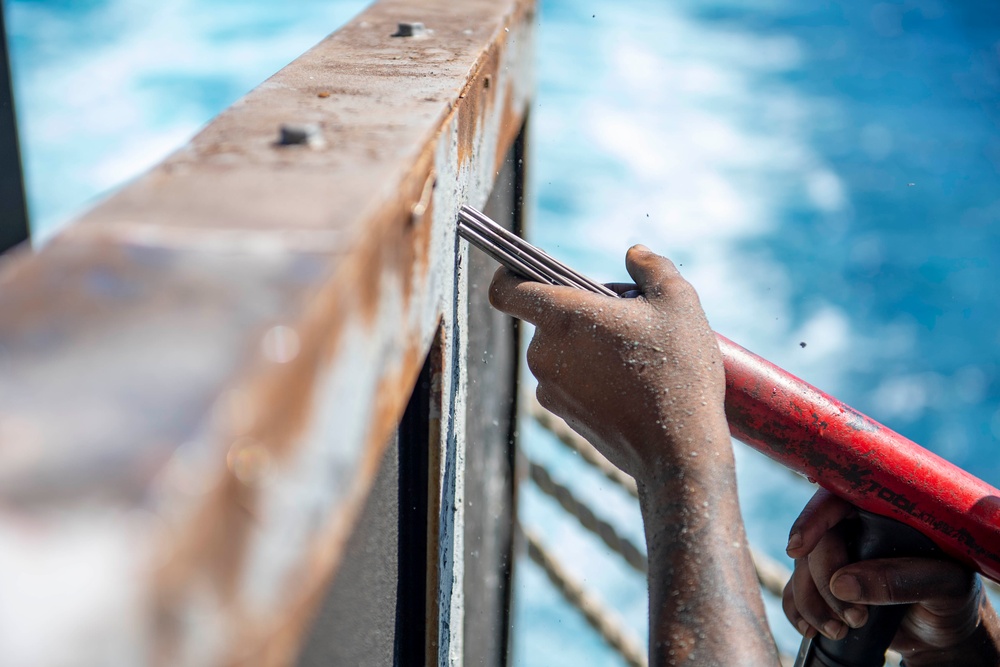 USS Carl Vinson (CVN 70) Sailor Conducts Maintenance