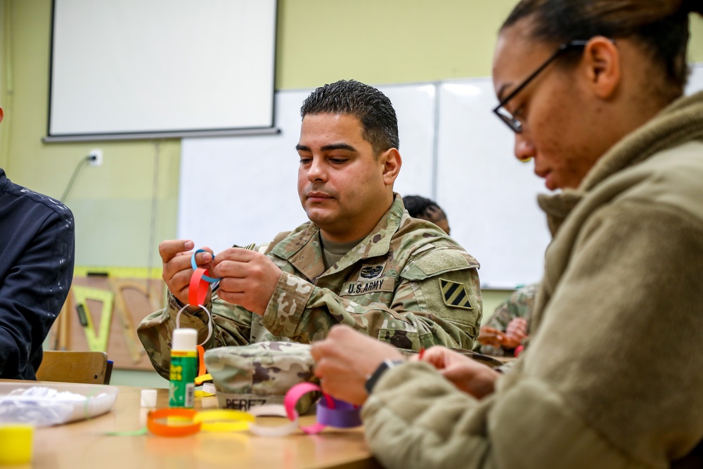 Sustainment Soldiers Visit Powidz School for Holiday Party