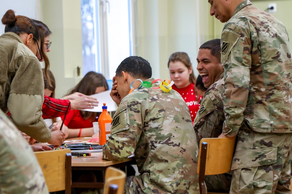 Sustainment Soldiers Visit Powidz School for Holiday Party