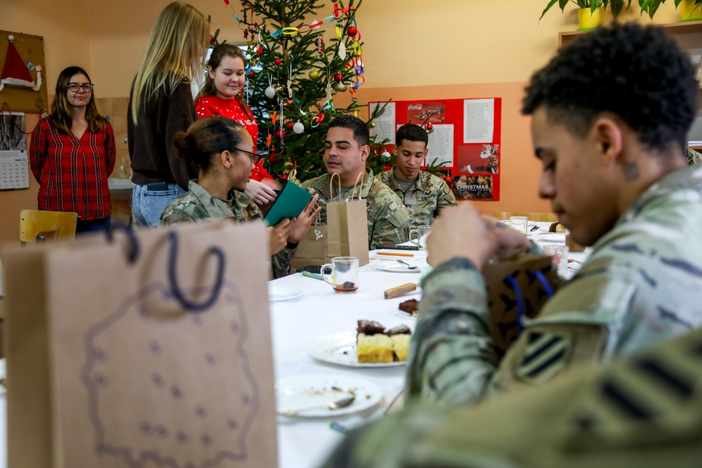 Sustainment Soldiers Visit Powidz School for Holiday Party