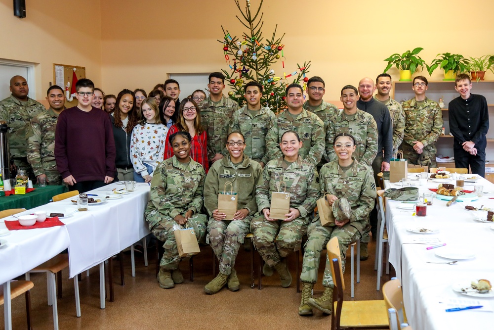 Sustainment Soldiers Visit Powidz School for Holiday Party