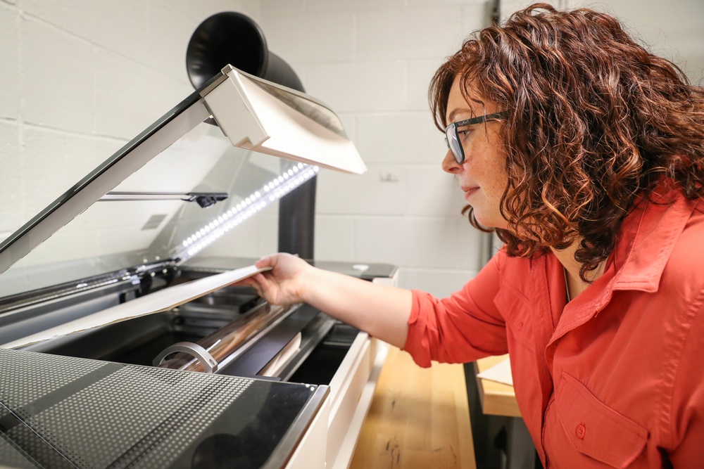 NSWC IHD CBRD engineer uses laser cutter