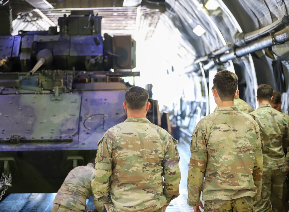 Army and Air Force Load Bradley Fighting Vehicle on C-5 Galaxy