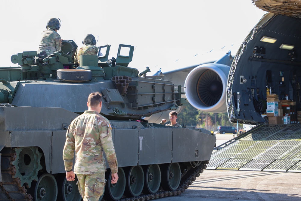 DVIDS - Images - Army and Air Force Load Bradley Fighting Vehicle on C ...