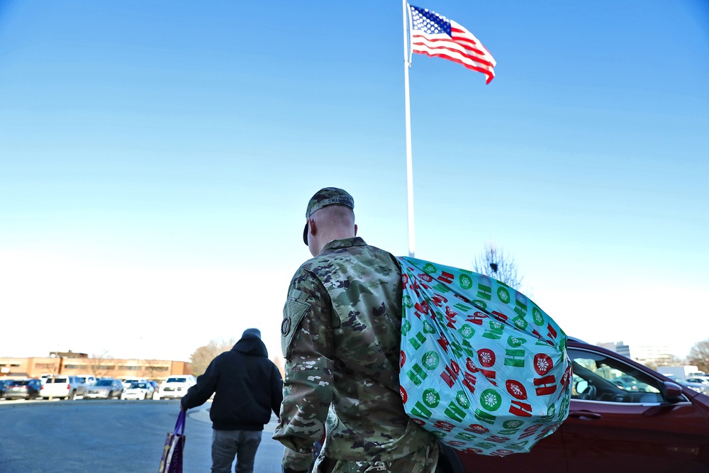 Army Reserve Soldiers participate in a toy drive for children at local hospital pediatric unit