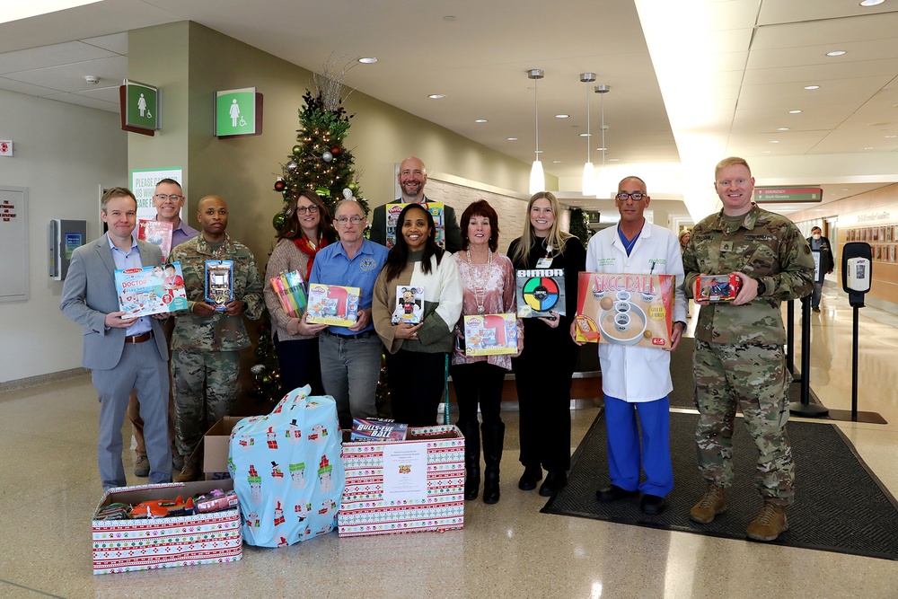 Army Reserve Soldiers participate in a toy drive for children at local hospital pediatric unit
