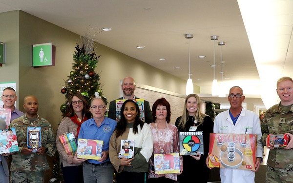 Army Reserve Soldiers participate in a toy drive for children at local hospital pediatric unit