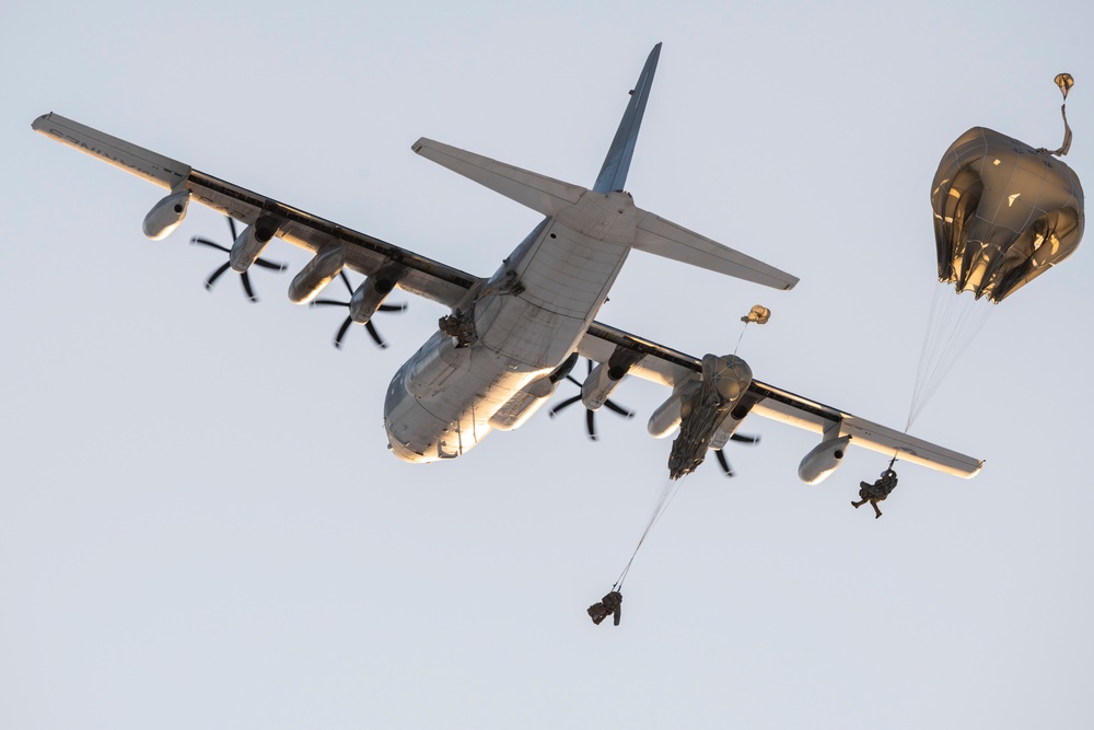 Army paratroopers and Marine Corps aviators conduct joint airborne training at JBER