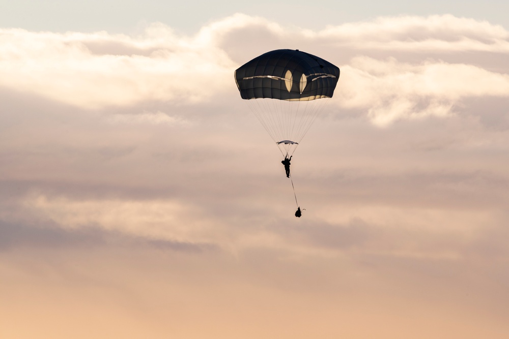 Army paratroopers and Marine Corps aviators conduct joint airborne training at JBER