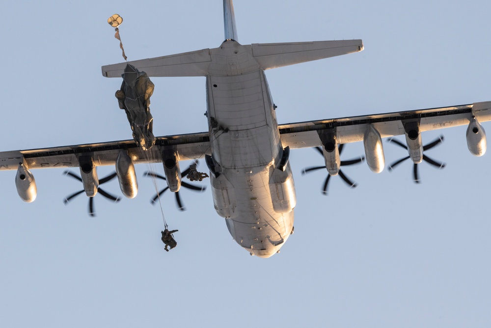 Army paratroopers and Marine Corps aviators conduct joint airborne training at JBER