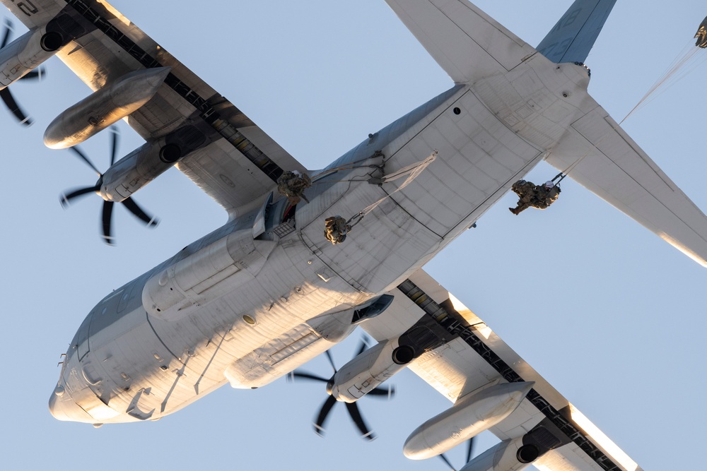 Army paratroopers and Marine Corps aviators conduct joint airborne training at JBER