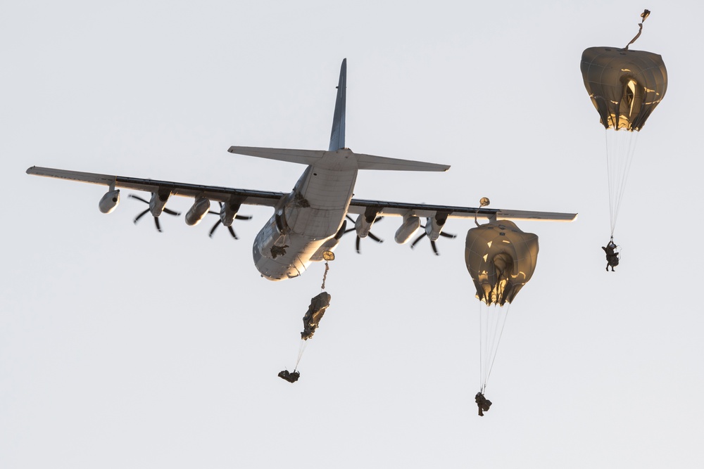 Army paratroopers and Marine Corps aviators conduct joint airborne training at JBER