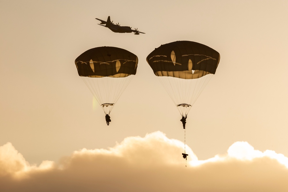 Army paratroopers and Marine Corps aviators conduct joint airborne training at JBER