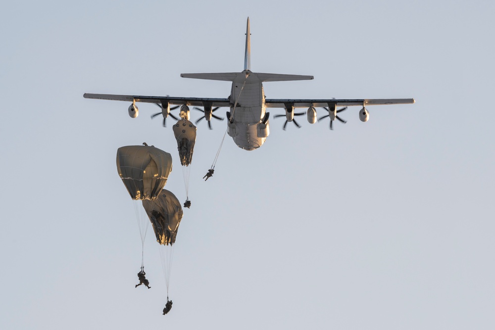 Army paratroopers and Marine Corps aviators conduct joint airborne training at JBER