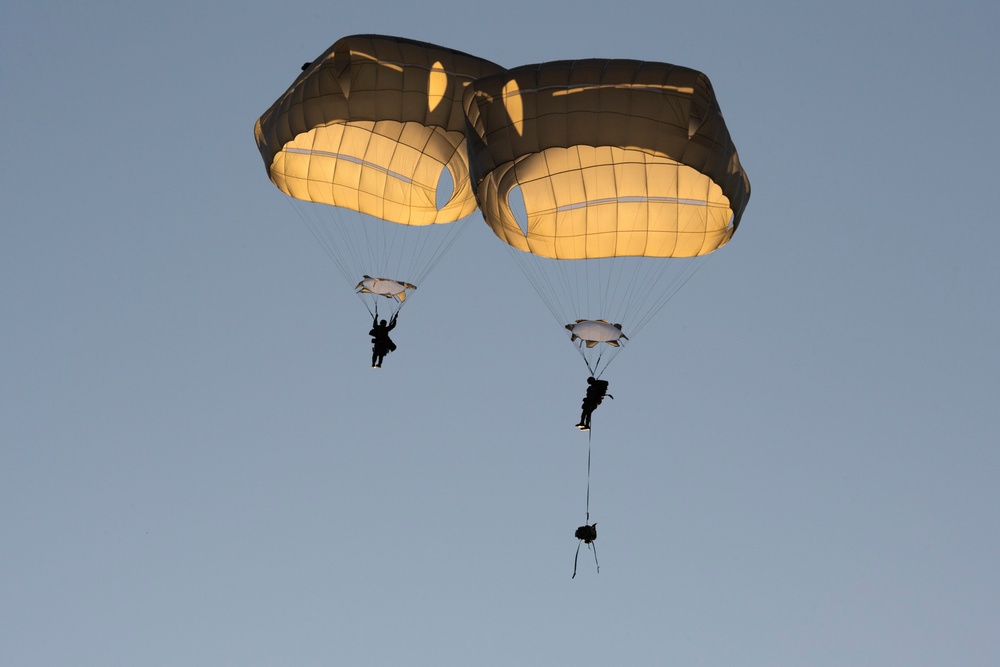 Army paratroopers and Marine Corps aviators conduct joint airborne training at JBER