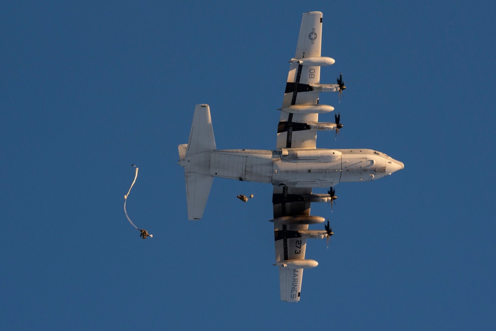 Army paratroopers and Marine Corps aviators conduct joint airborne training at JBER