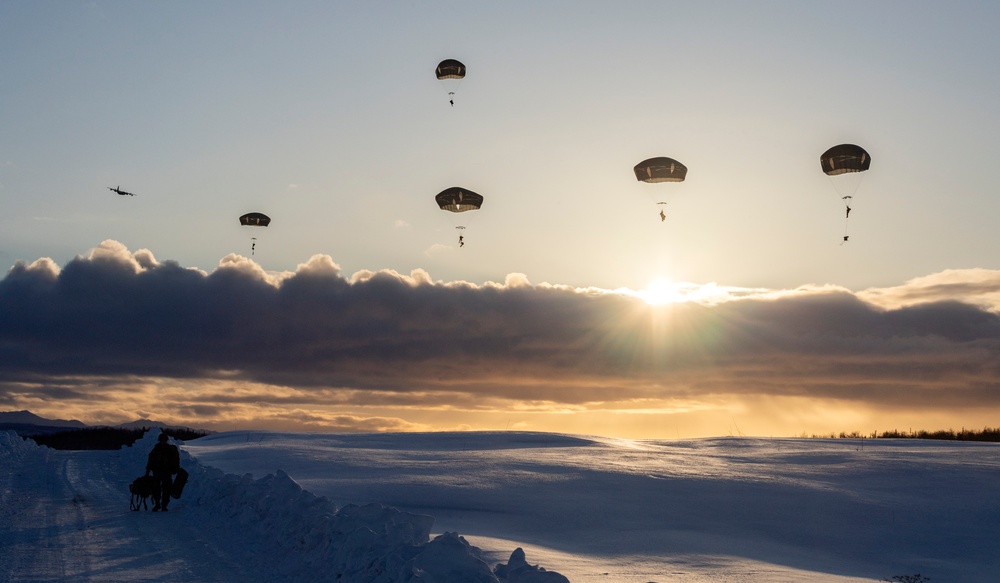 Army paratroopers and Marine Corps aviators conduct joint airborne training at JBER