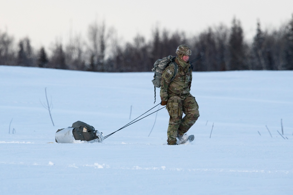 Army paratroopers and Marine Corps aviators conduct joint airborne training at JBER