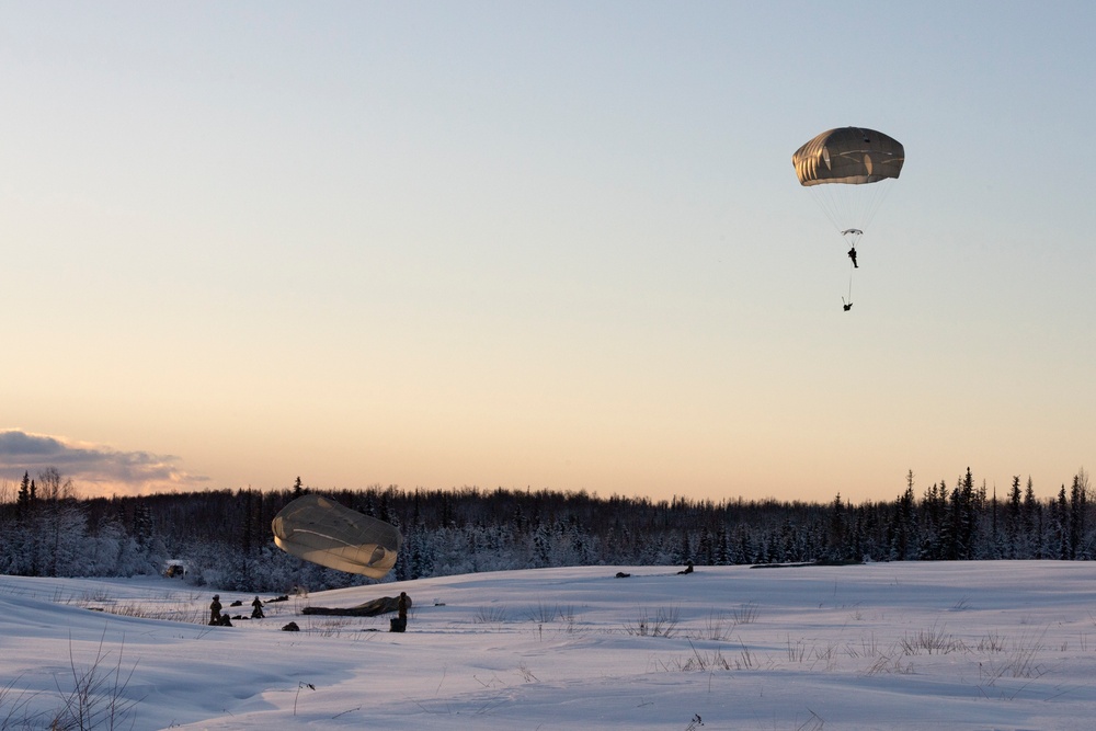 Army paratroopers and Marine Corps aviators conduct joint airborne training at JBER