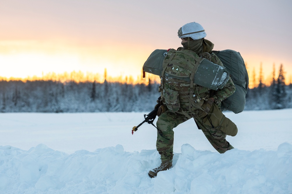 Army paratroopers and Marine Corps aviators conduct joint airborne training at JBER