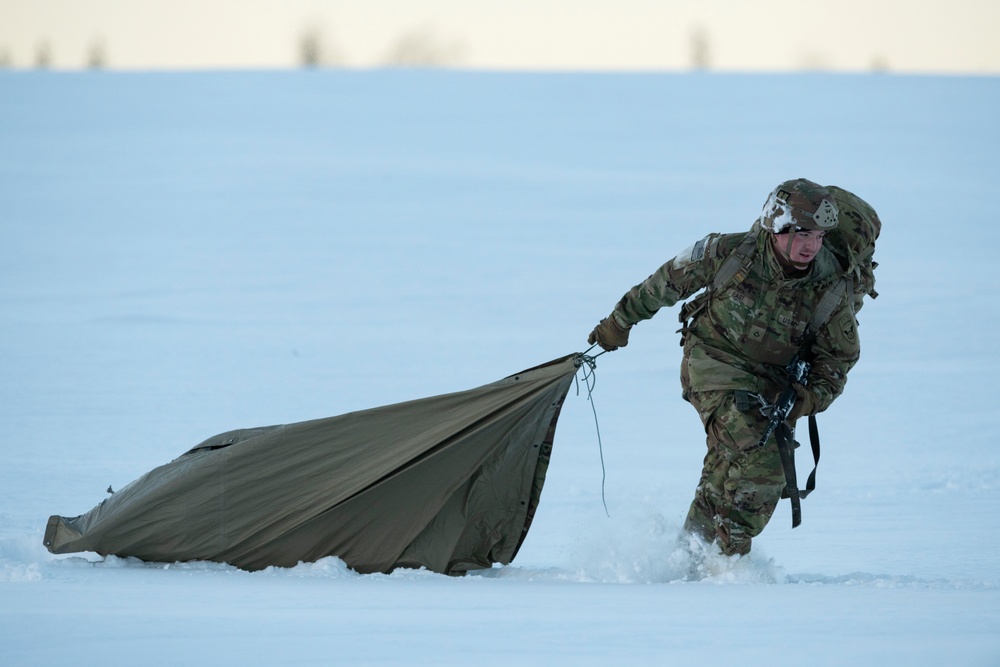 Army paratroopers and Marine Corps aviators conduct joint airborne training at JBER