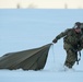 Army paratroopers and Marine Corps aviators conduct joint airborne training at JBER