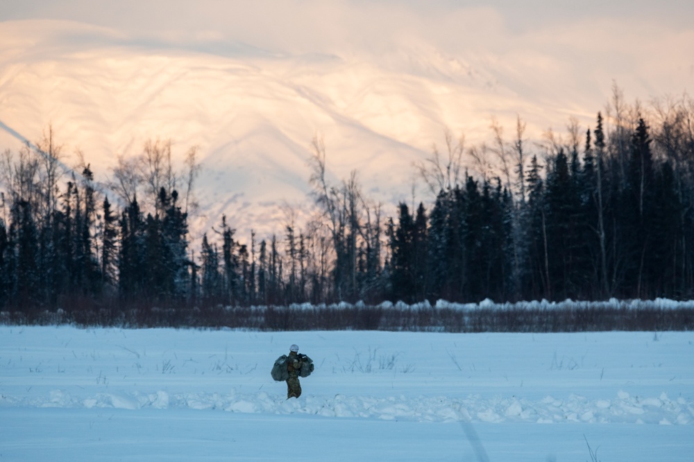 Army paratroopers and Marine Corps aviators conduct joint airborne training at JBER