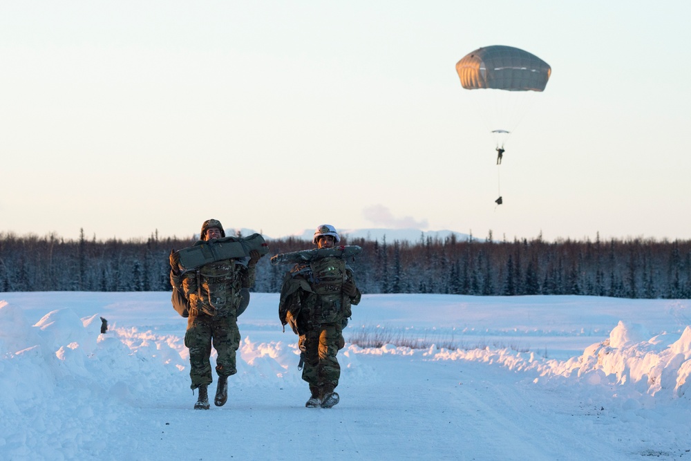 Army paratroopers and Marine Corps aviators conduct joint airborne training at JBER