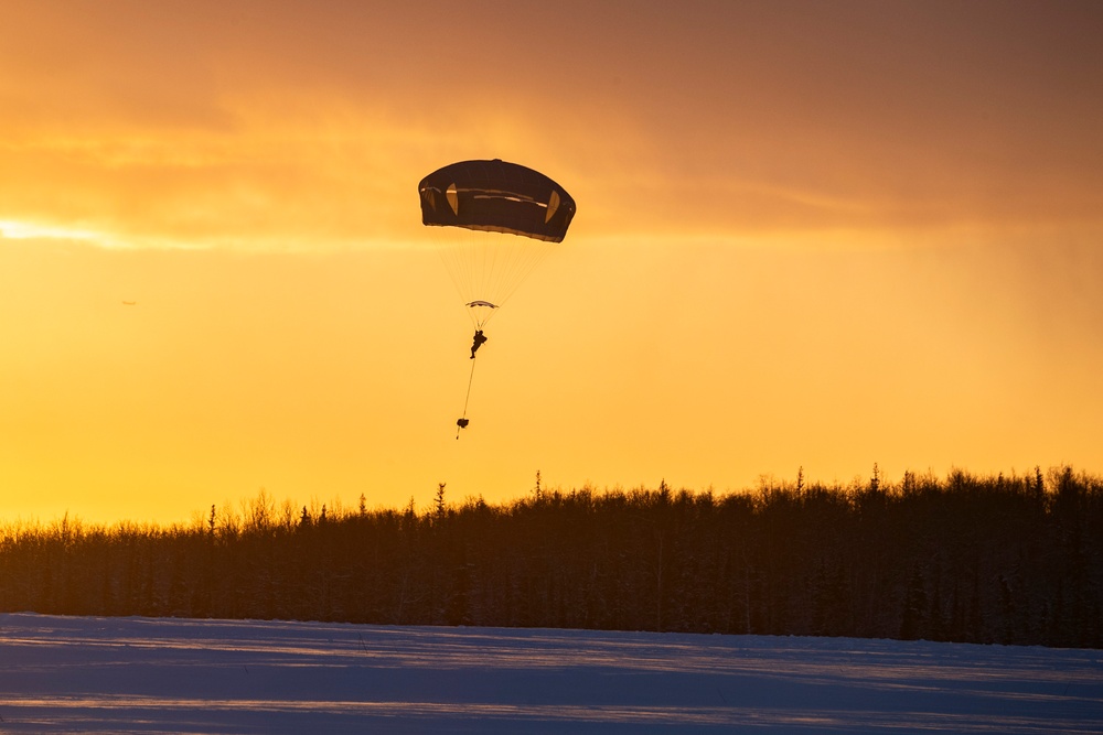 Army paratroopers and Marine Corps aviators conduct joint airborne training at JBER