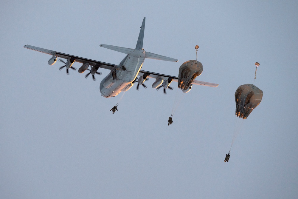 Army paratroopers and Marine Corps aviators conduct joint airborne training at JBER