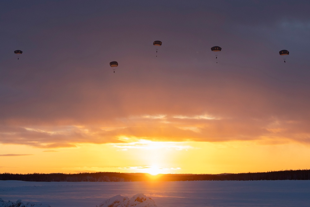 Army paratroopers and Marine Corps aviators conduct joint airborne training at JBER