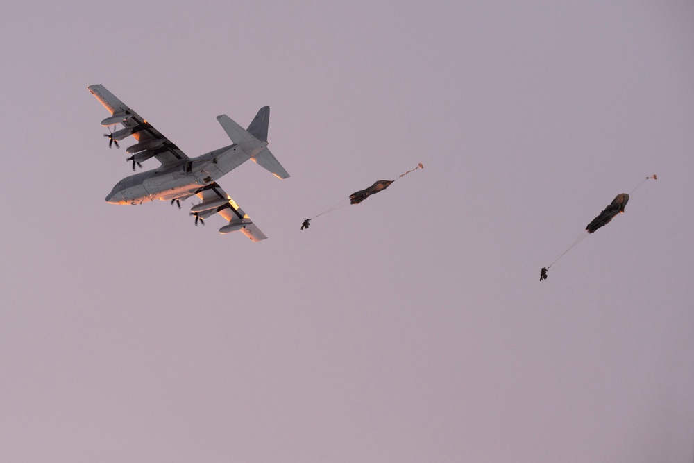 Army paratroopers and Marine Corps aviators conduct joint airborne training at JBER