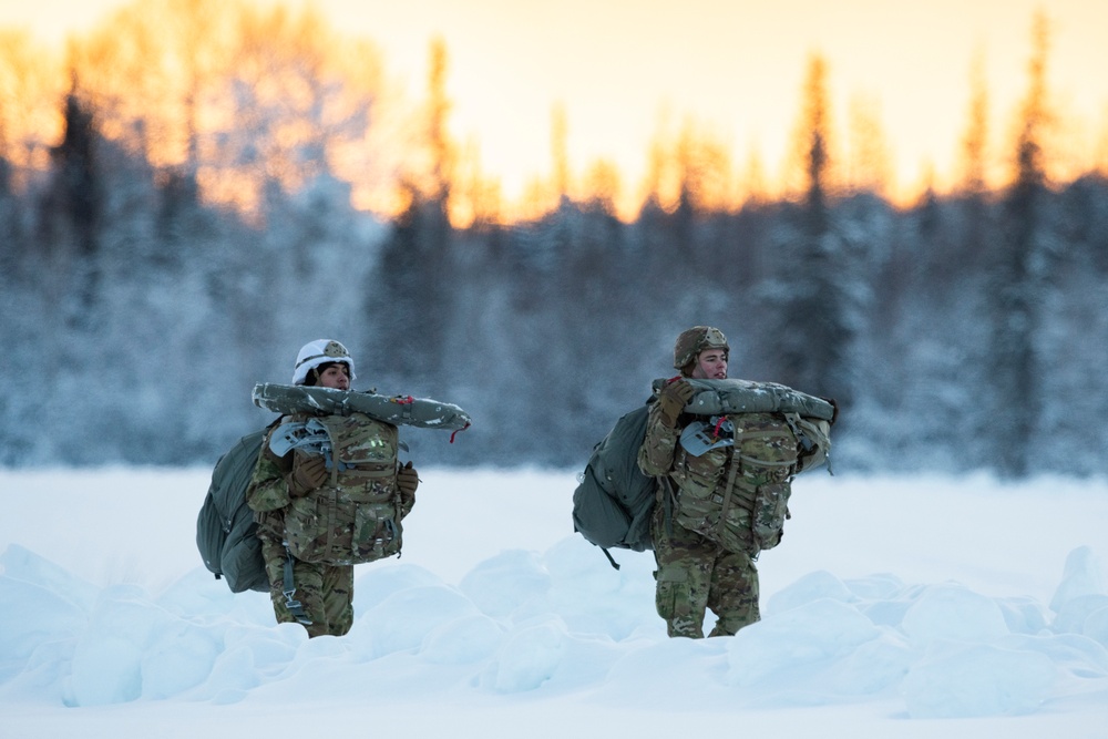 Army paratroopers and Marine Corps aviators conduct joint airborne training at JBER