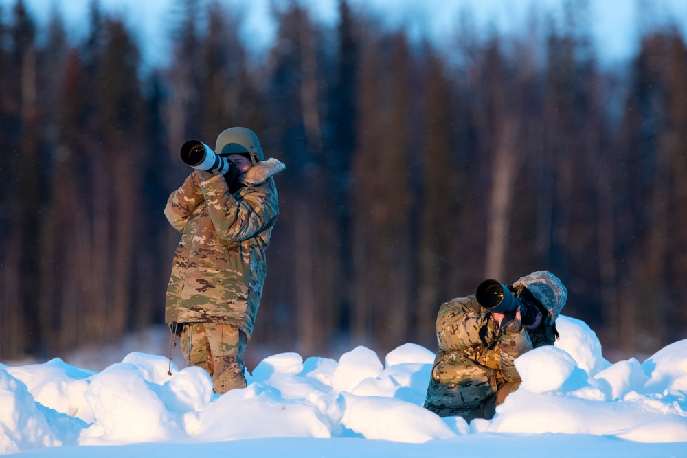 Army paratroopers and Marine Corps aviators conduct joint airborne training at JBER