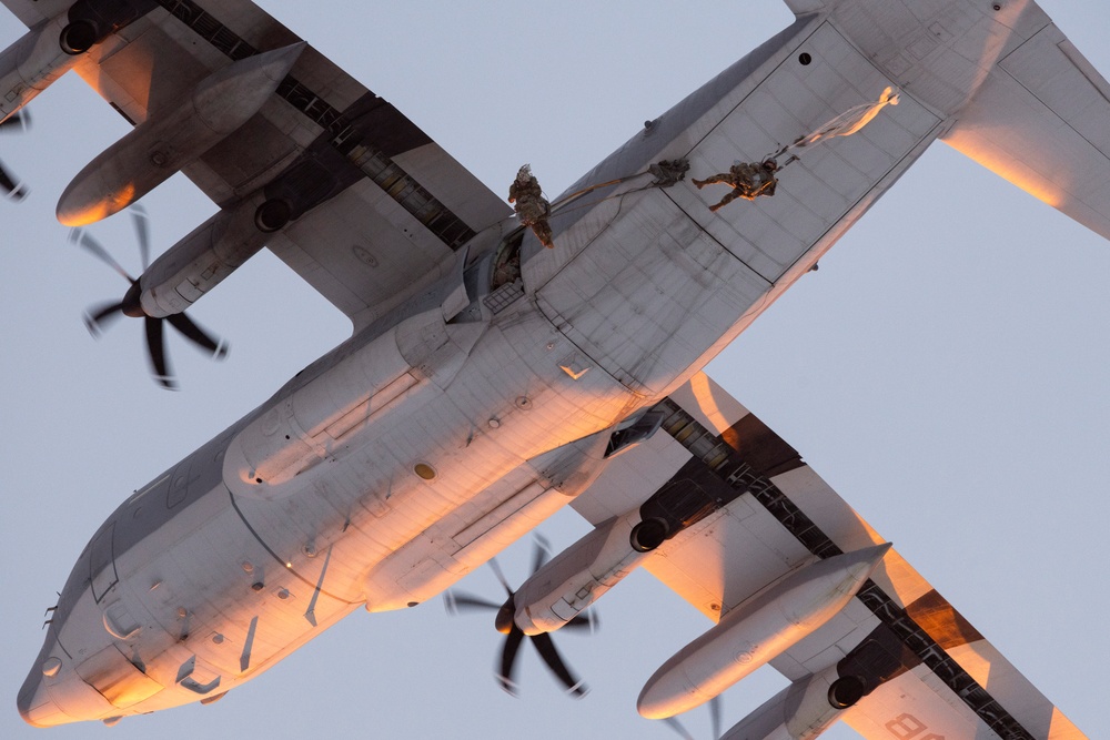 Army paratroopers and Marine Corps aviators conduct joint airborne training at JBER